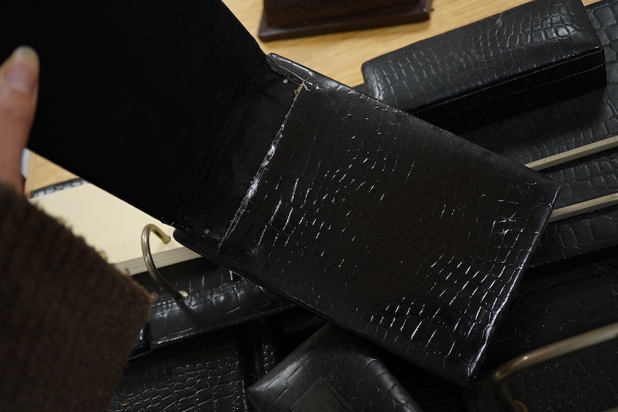 A seven-piece crocodile skin-effect desk set